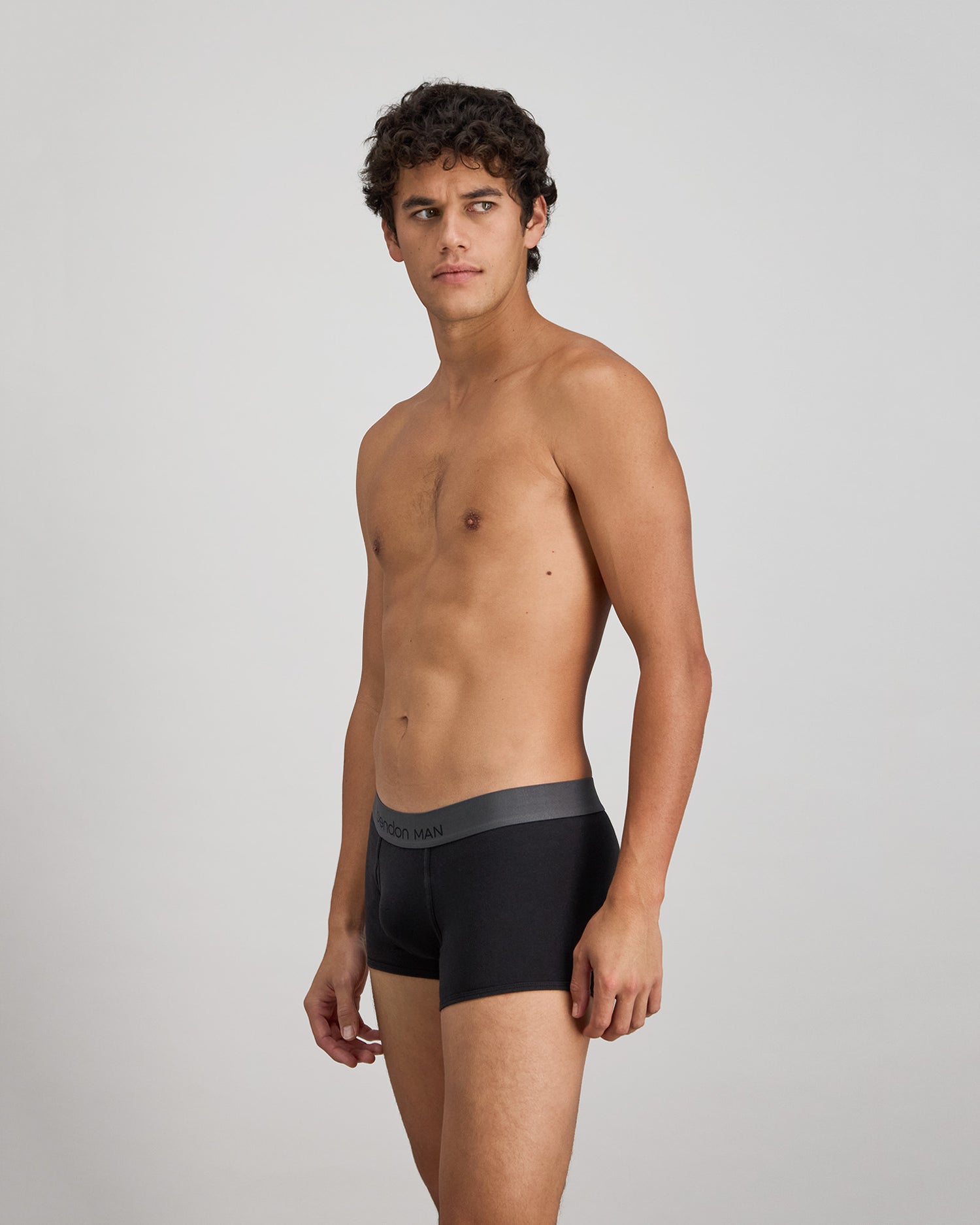 Cotton Low-Rise Mens Trunk in BLACK. Flat lay back view