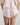 Model wears Dreamer Short in PALE LILAC. On body back view