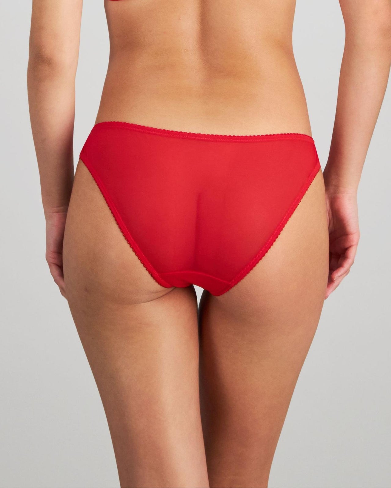 Model wears Sofia Bikini in SALSA. On body back view