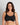 Model wears Power Underwire Bra in BLACK. On body front view