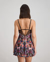 Model wears Adaline Chemise in BLACK FLORAL PRINT. On body back view