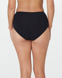 Model wears Embrace Full Brief in BLACK. On body back view