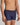 Model wears Cotton Stretch Mens Trunk in PEACOAT PINSTRIPE. On body side view