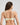 Model wears Embrace Contour Bra in TRANSPARENT YELLOW. On body back view