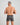 Model wears Cotton Classics Mens Trunk in GREY MARL. On body back view