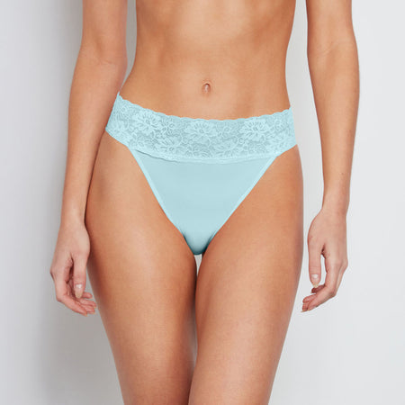 Model wears Lace Trim High Cut Brief in ETHER. On body front view