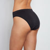 Model wears Seamless High Cut Brief in BLACK. On body back view