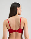 Model wears Lumiere Underwire Bra in SALSA. On body back view
