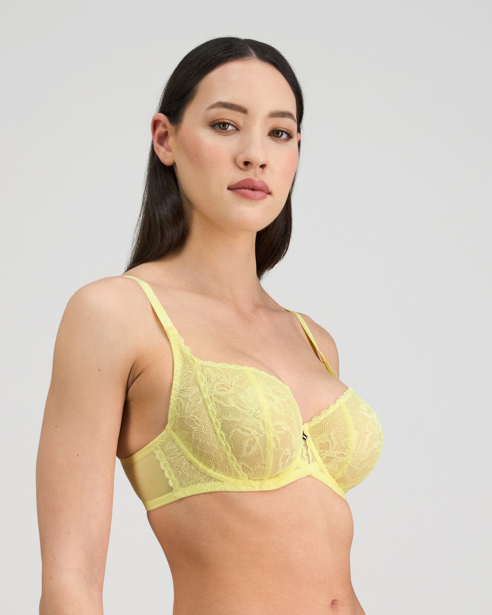Model wears Elevate Underwire Bra in LEMON MERINGUE. On body side view