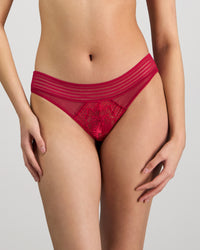 Model wears Lucille Bikini in JAZZY. On body front view