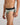 Model wears Everyday Essential Mens Brief in ICEBERG GREEN. On body side view