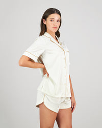 Model wears Holly Short PJ in IVORY. On body side view