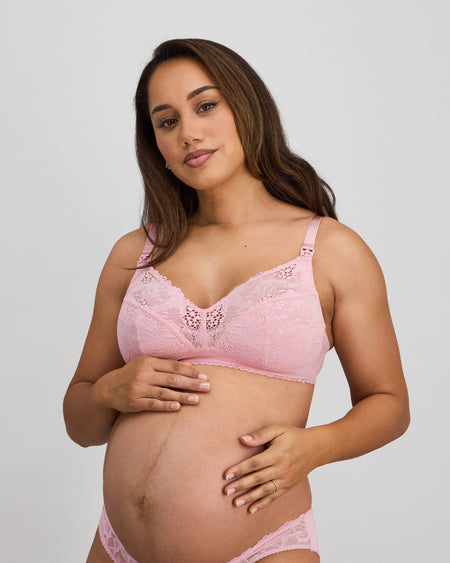 Model wears Bendon Nurture Maternity Bra in ICY PINK. On body front view