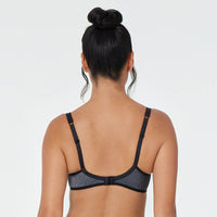 Model wears The One Contour Bra in BLACK SILVER MARLE. On body back view