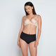 Model wears Medium Control Full Brief in BLACK. On body front view