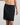 Model wears Understatement Slip in BLACK. On body front view