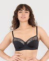 Model wears Castaway Contour Long Line Bra in BLACK. On body front view