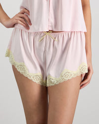 Model wears Dreamer Short in PALE LILAC. On body front view