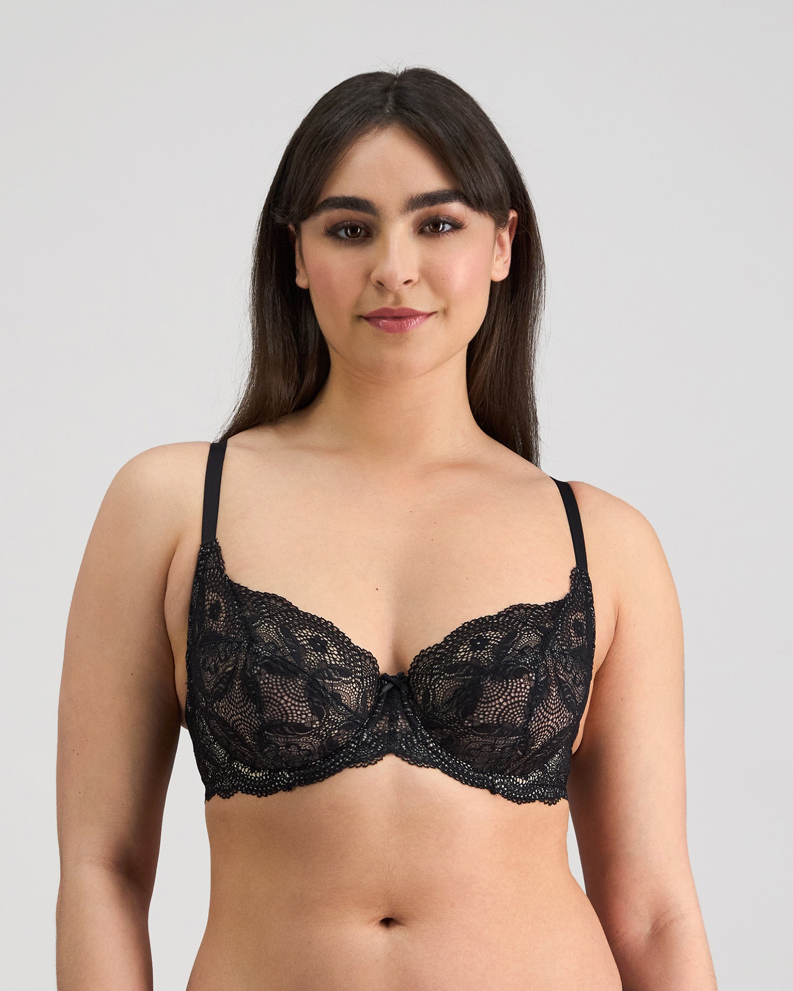 Model wears Juniper Underwire Bra in BLACK. On body front view