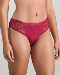 Model wears Legacy Bikini in BEAUJOLAIS. On body side view