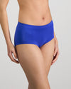 Model wears Seamless Soft Full Brief in DAZZLING BLUE. On body side view