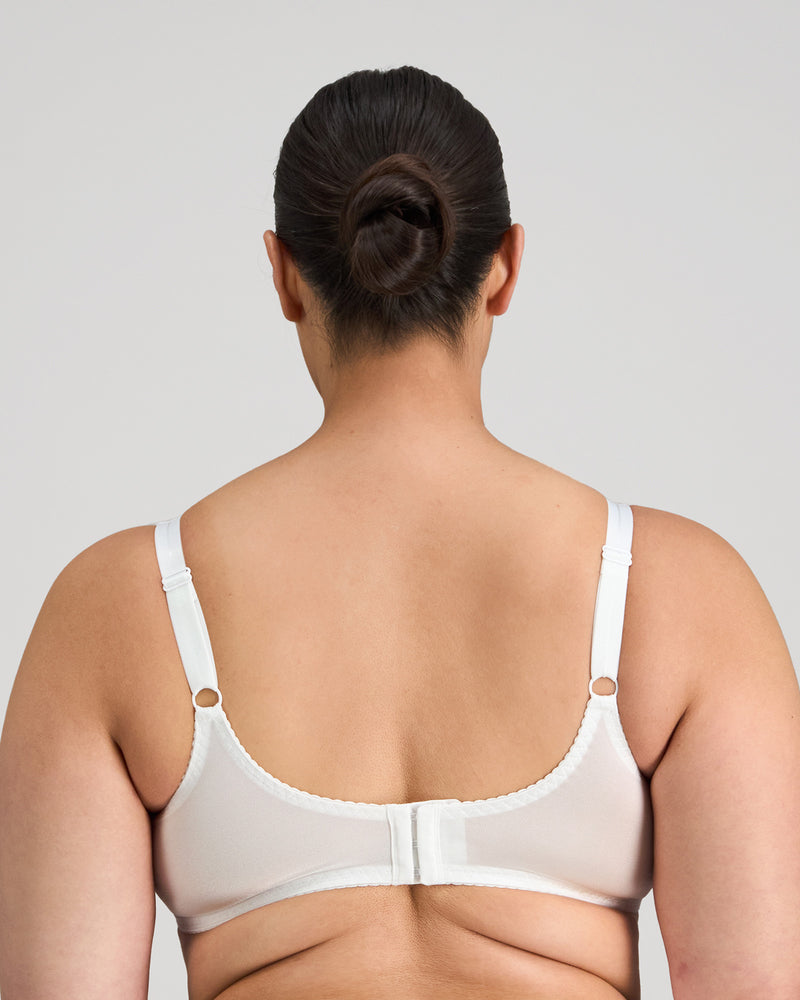 Model wears Classic Underwire Underwire Bra in WHITE. On body back view