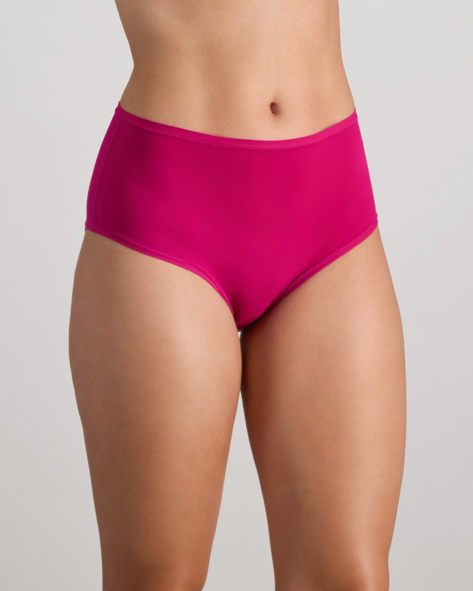 Model wears Extra-Ordinary Full Brief in FANTASY FUCHSIA. On body side view