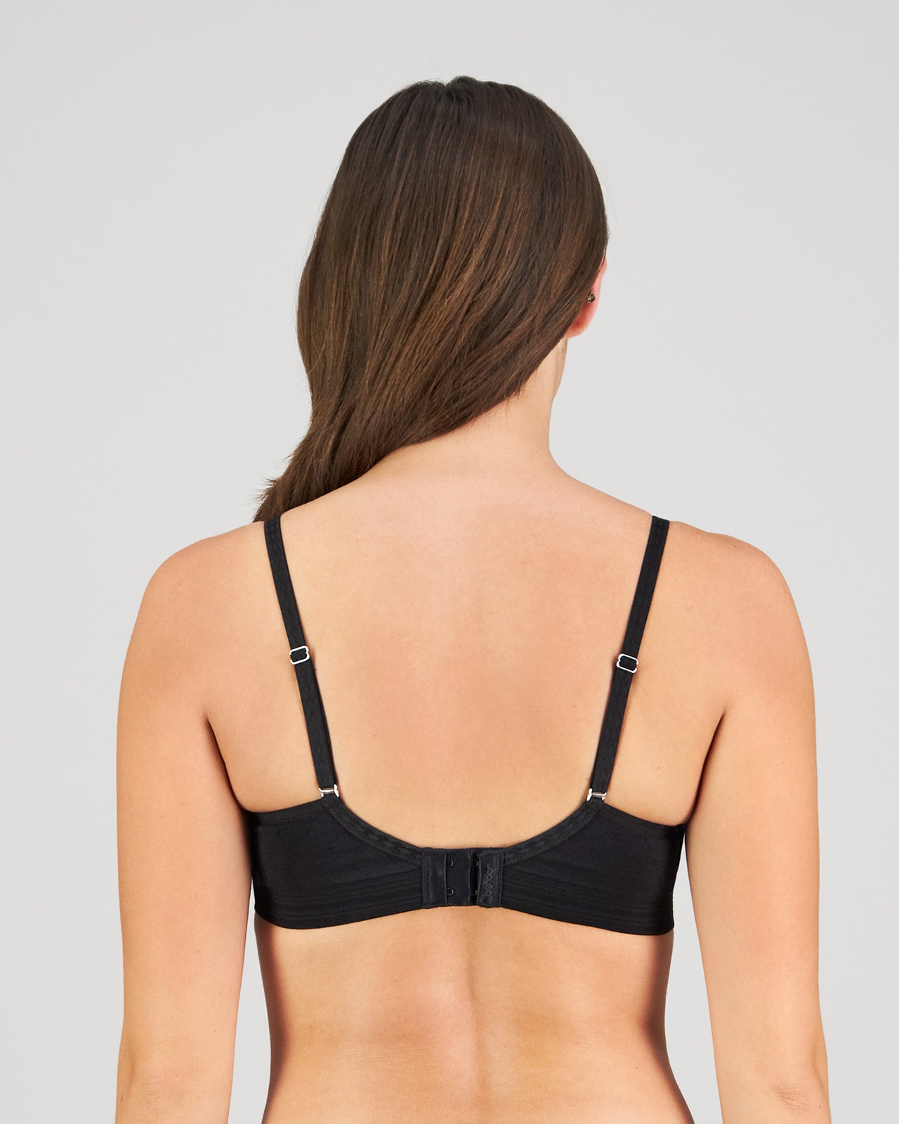 Model wears Bendon Body Lace Contour Bra in BLACK. On body back view