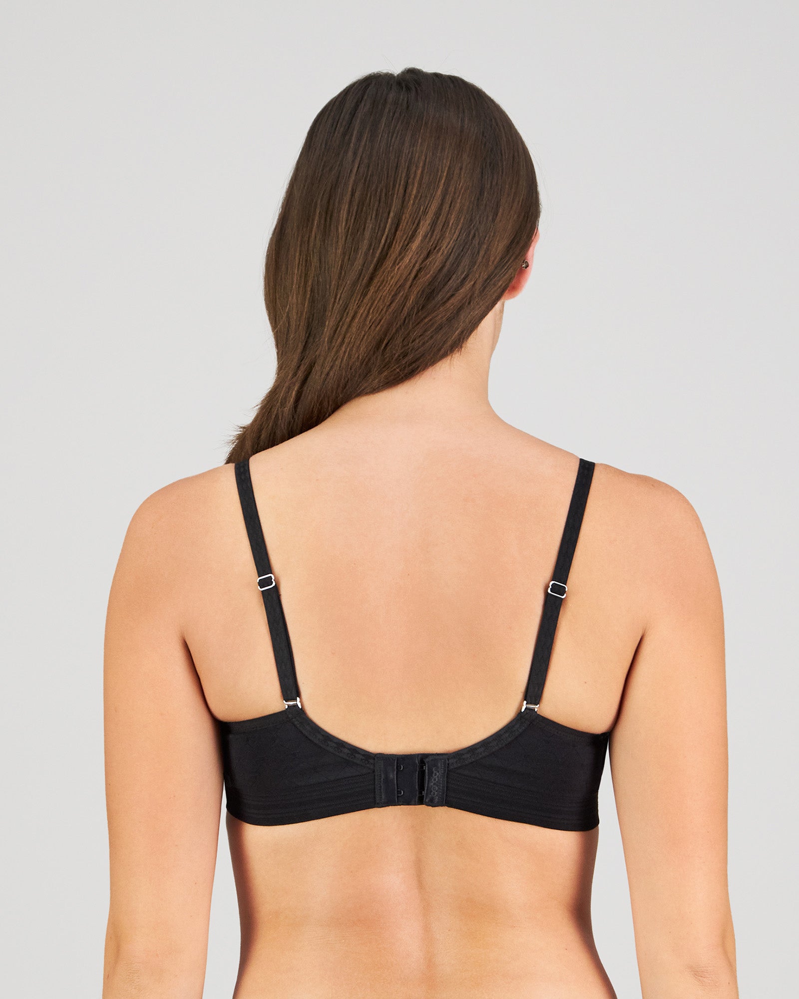 Model wears Bendon Body Lace Contour Bra in BLACK. On body back view