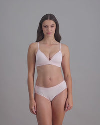 model-wears-light-pink-lingerie-set