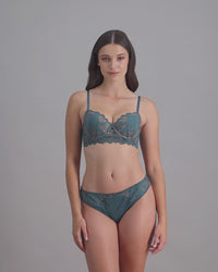 model-poses-in-blue-bra-and-underwear