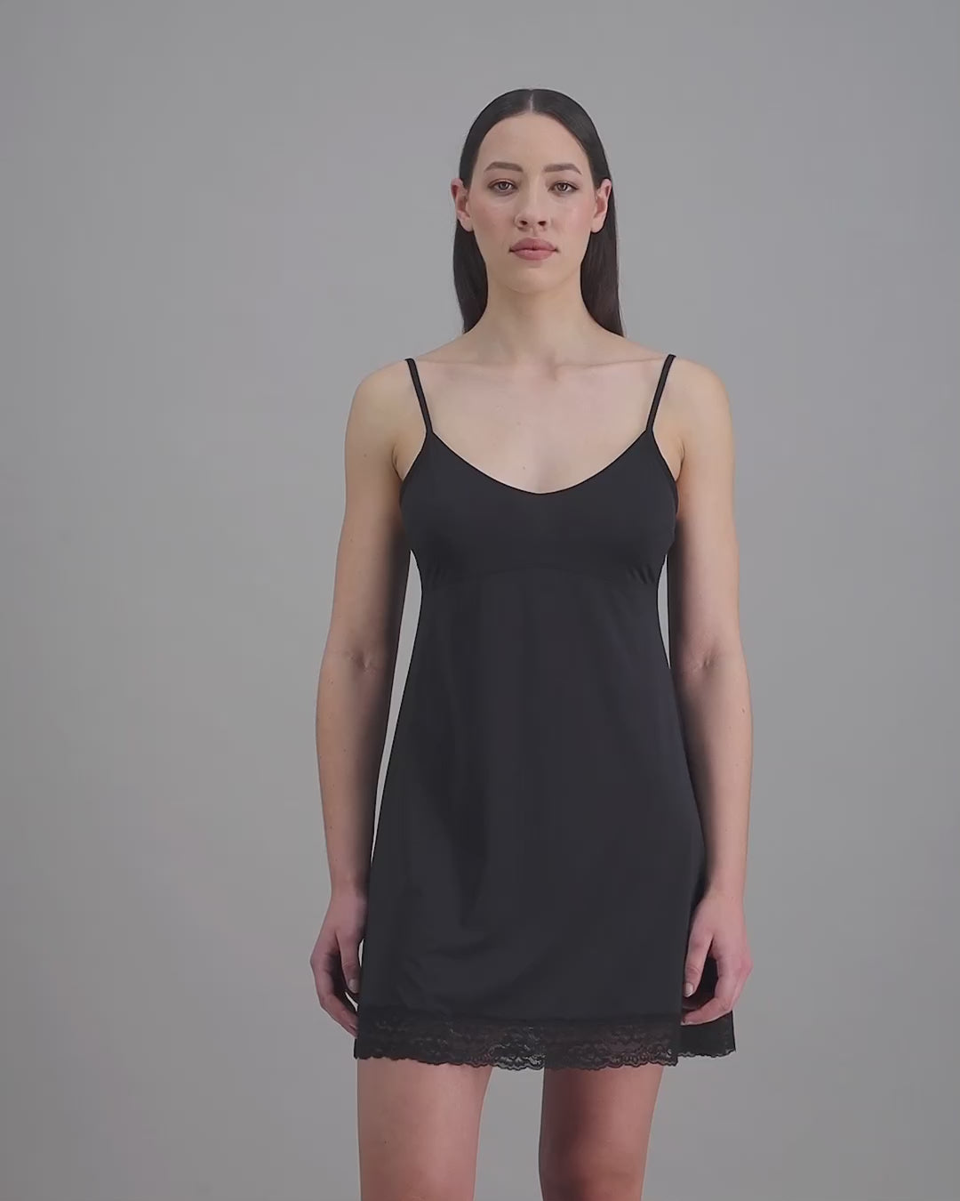 model-wears-black-dress-slip