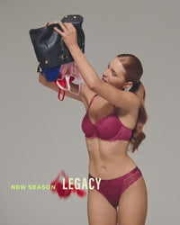 model-poses-in-legacy-red-lingerie-set