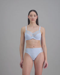 model-poses-in-light-blue-bra-and-underwear-set