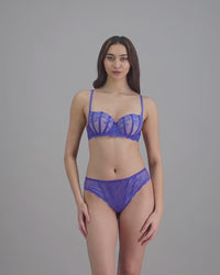 model-poses-in-blue-bra-and-underwear-set