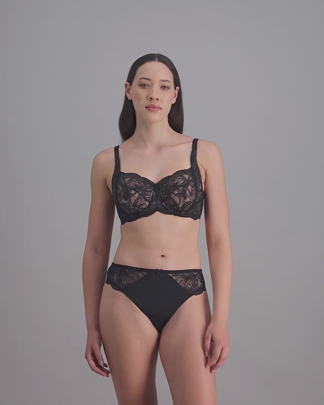 model-poses-in-black-lingerie-set