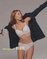 model-poses-in-white-lingerie-set