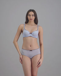 model-poses-in-light-blue-bra-and-underwear-set