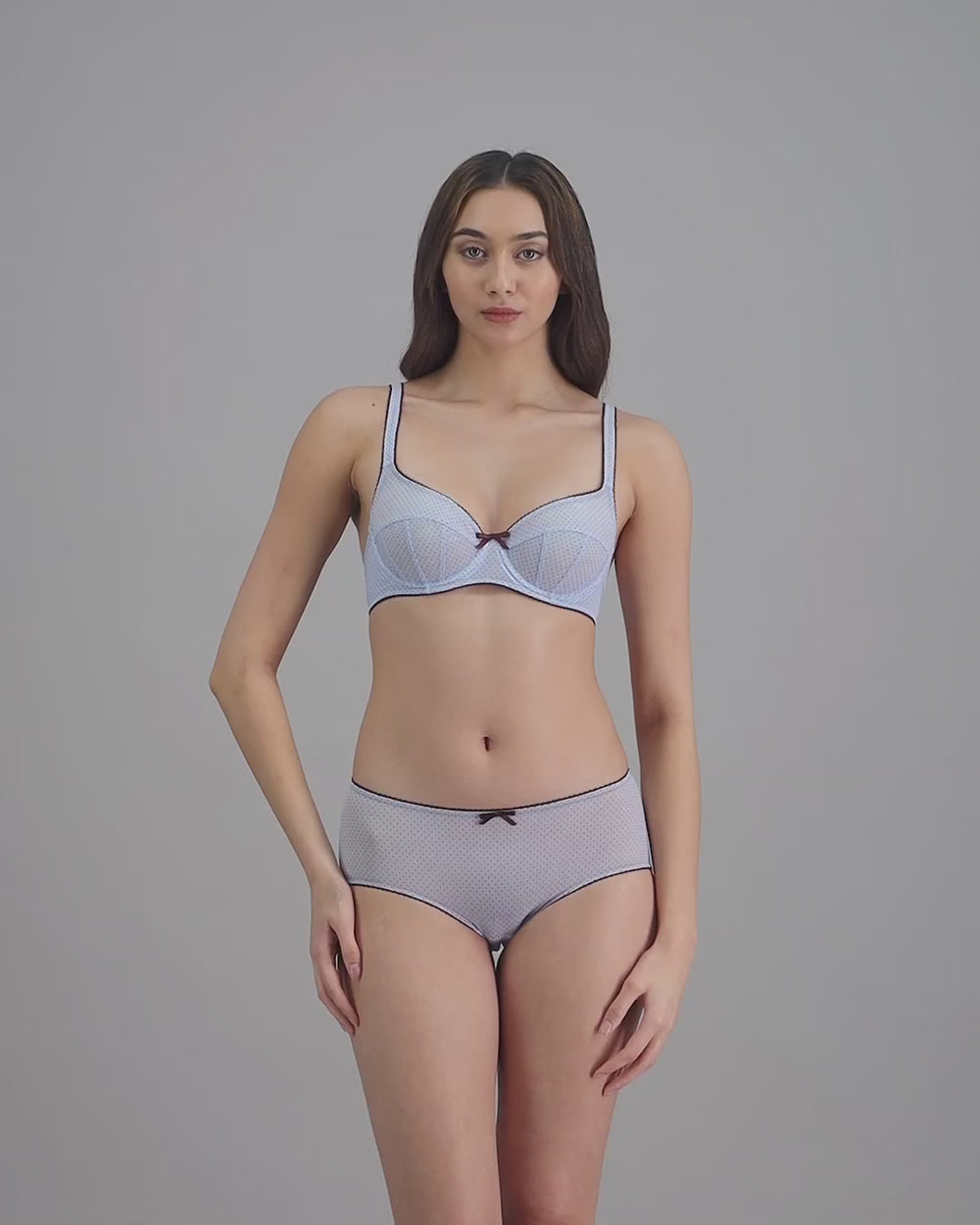 model-poses-in-light-blue-bra-and-underwear-set
