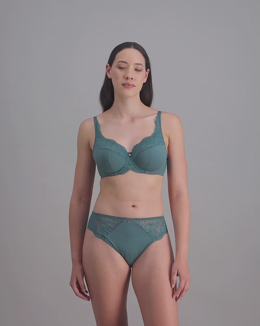 model-poses-in-blue-bra-and-underwear