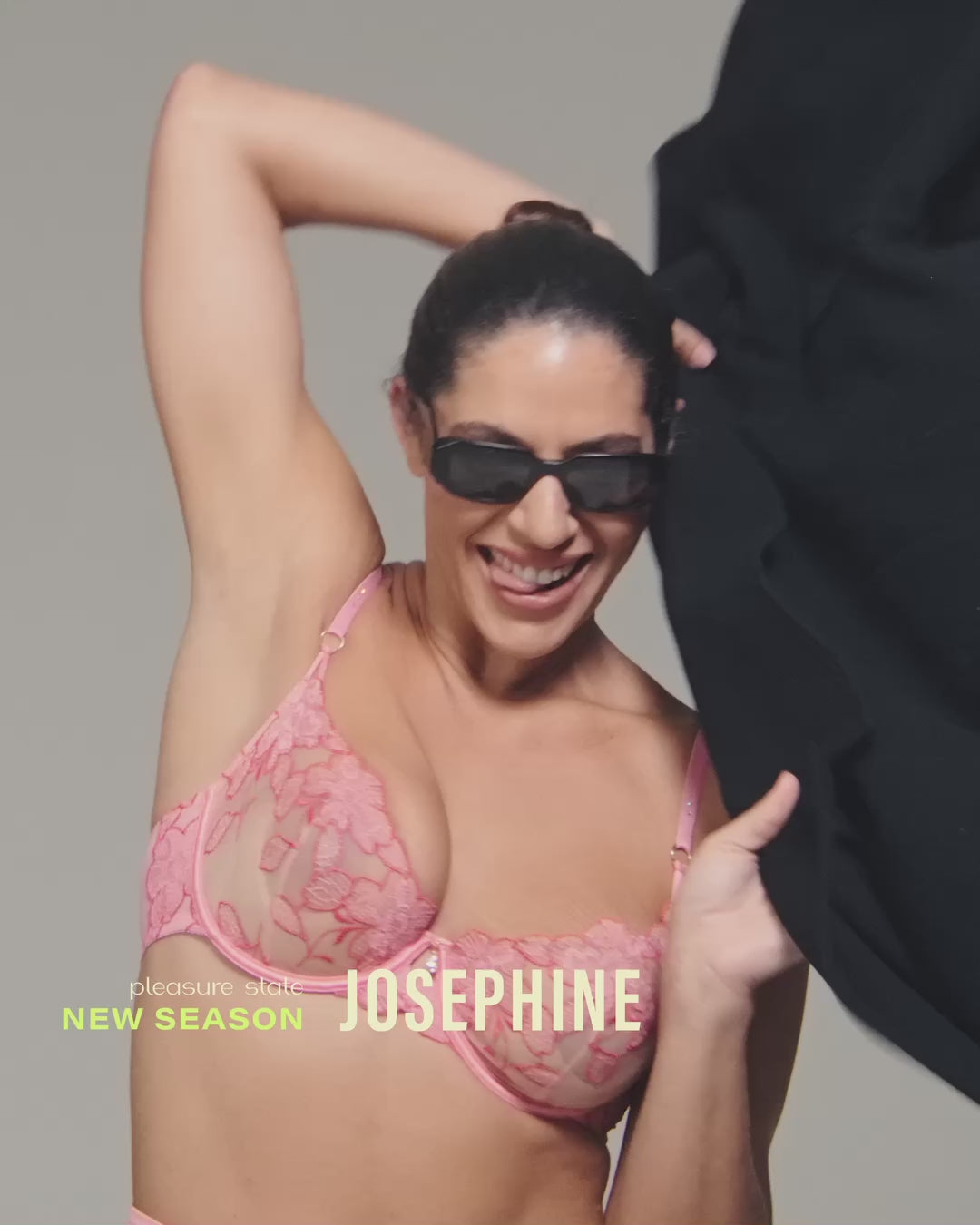 model-poses-in-pink-and-red-embroidered-lingerie
