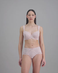 model-poses-in-light-pink-bra-and-underwear