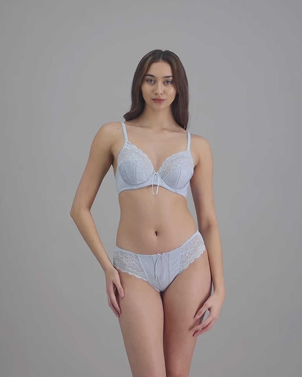 model-poses-in-light-blue-bra-and-underwear-set