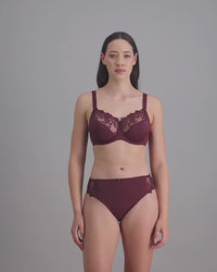 video of model wearing coral bra set in Figg colour