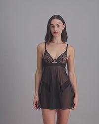model-poses-in-black-lace-chemise