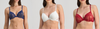Hero banner Three women wearing different styles of lace bras on a plain background